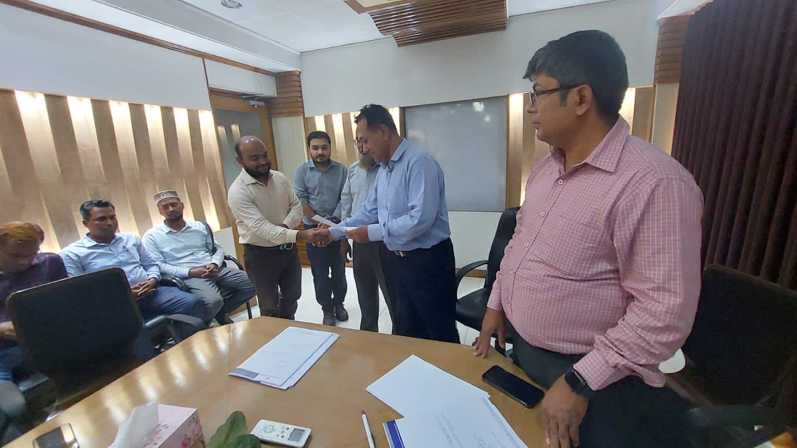 Promotion letter presentation by AKG management